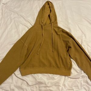 Forever 21; Yellow/khaki pullover with hoodie. Size small.
